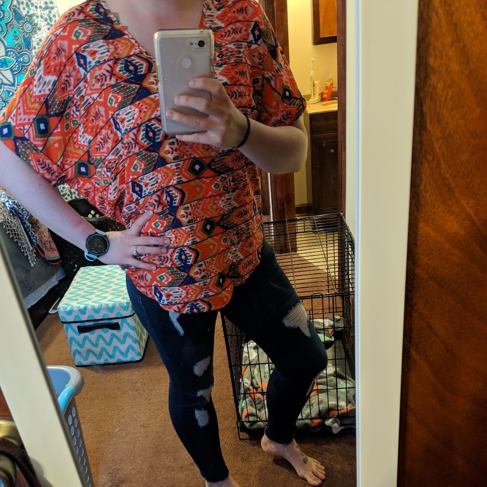 Orange aztec patterned blouse